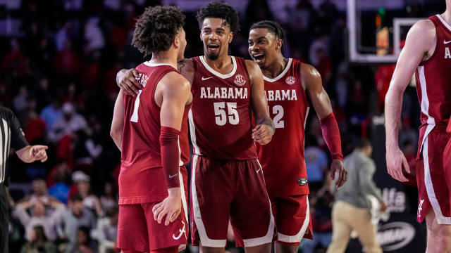 Jan 31, 2024; Athens, Georgia, USA; Alabama Crimson Tide guards Mark Sears (1) and Aaron Estrada (55) react after a comeback win against the Georgia Bulldogs at Stegeman Coliseum. Mandatory Credit: Dale Zanine-USA TODAY Sports  